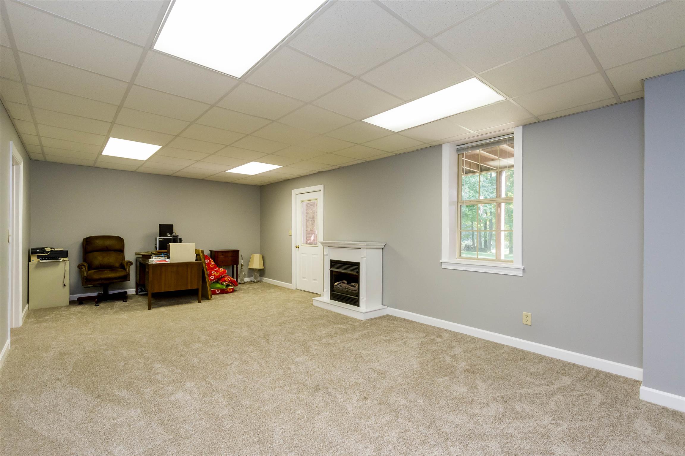 3611 Legacy Drive Springfield, TN 37172 - Photo 25 of 26 a living room with furniture and a fireplace