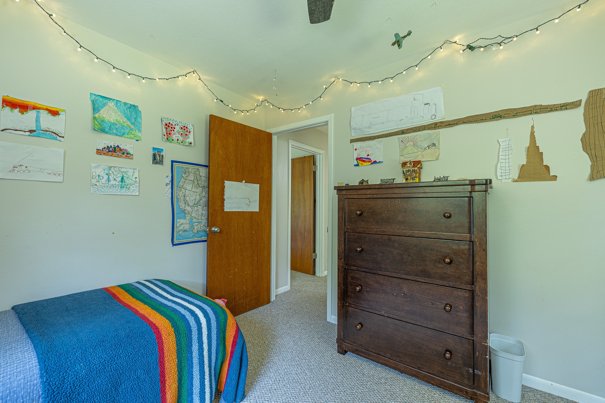 1009 Fish Hatchery Road Huntsville, TX 77320 - Photo 13 of 16 a bedroom with a bed and a dresser