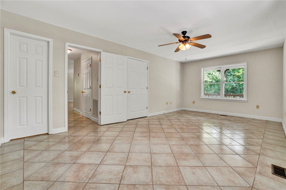 120 Patterson Ridge Road Salem, SC 29676 - Photo 13 of 46 Main level primary ensuite with dual closets to fill.