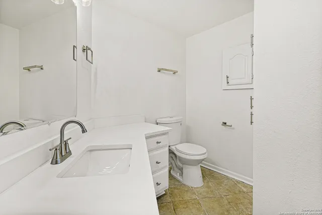 an empty room with a empty space and window