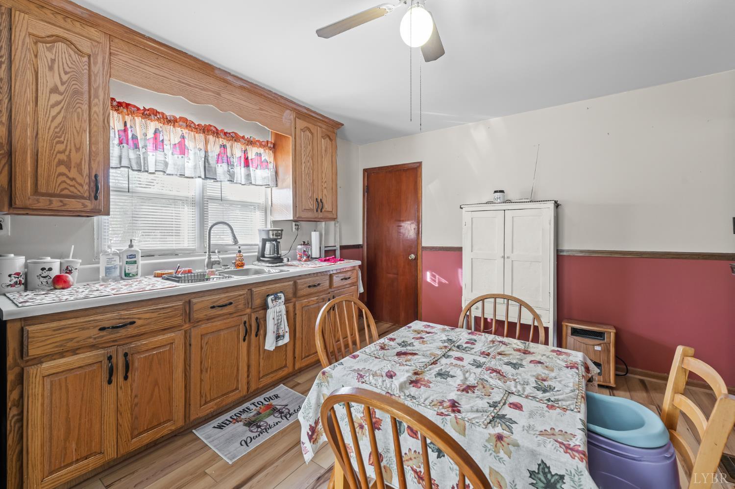 3169 Centerville Road Bedford, VA 24523 - Photo 12 of 25 a bedroom with a bed and a chandelier