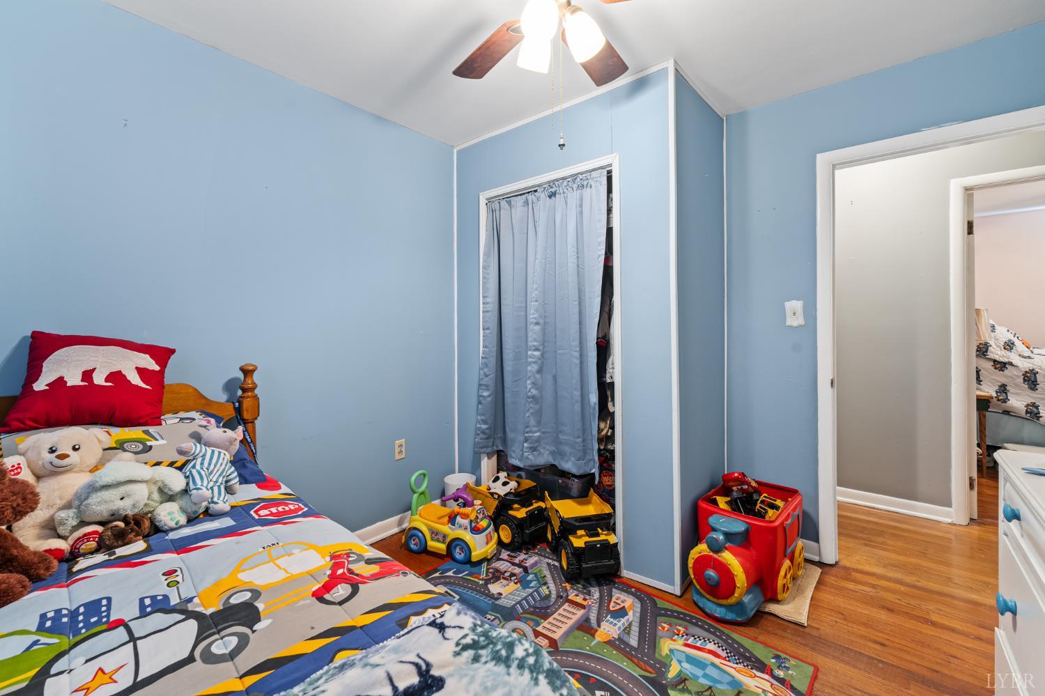 3169 Centerville Road Bedford, VA 24523 - Photo 21 of 25 a bedroom with toys and wooden floor
