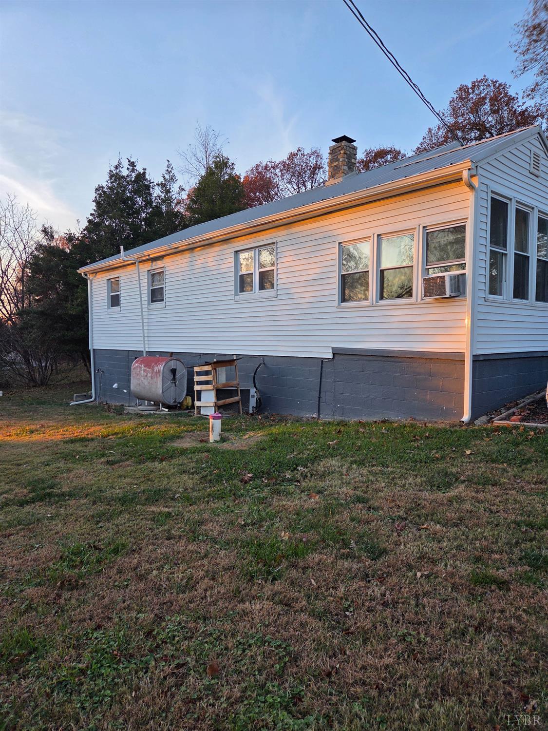 3169 Centerville Road Bedford, VA 24523 - Photo 4 of 25 a view of a house with a yard
