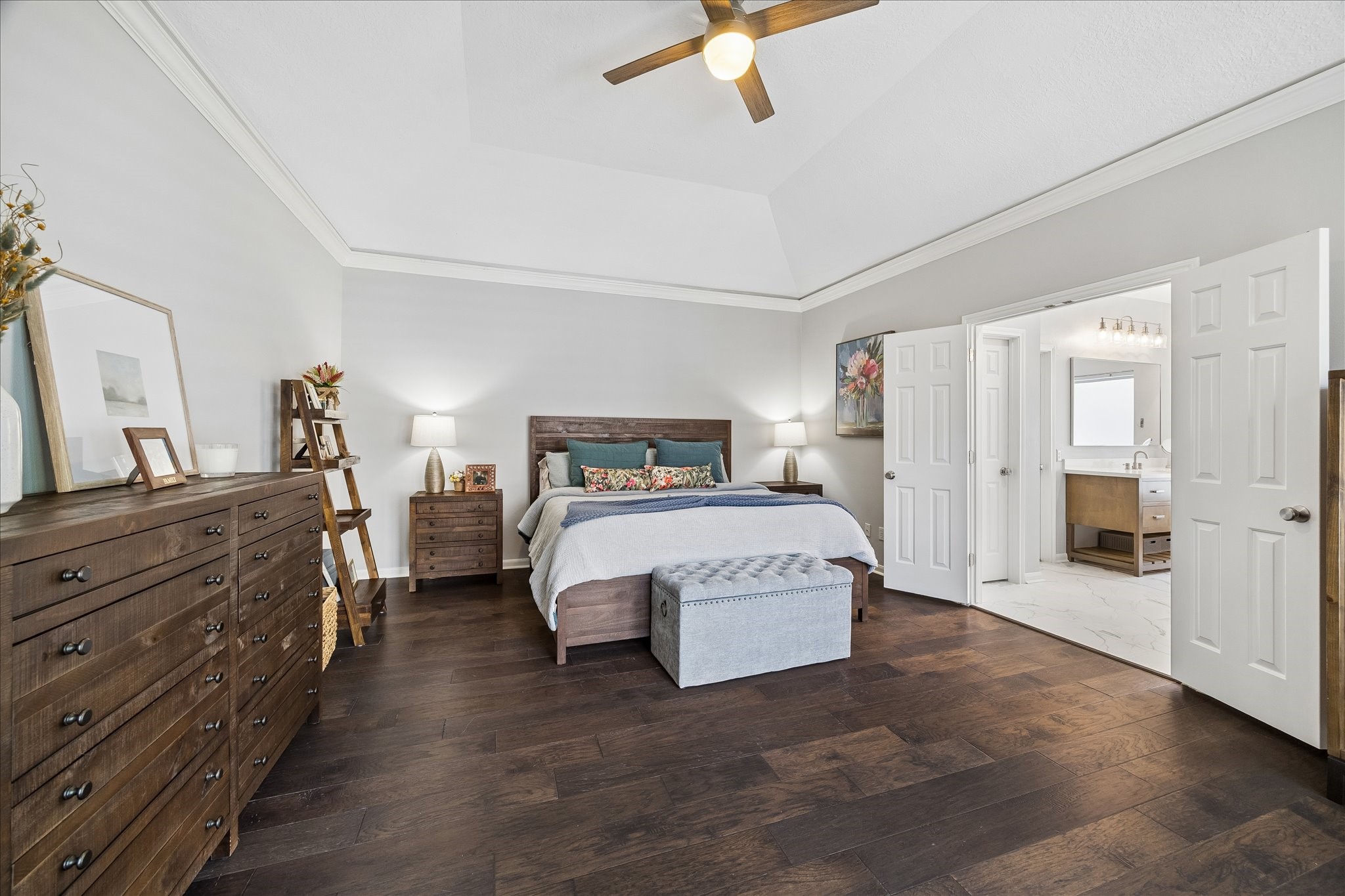2810 Timber Country Way Kingwood, TX 77345 - Photo 4 of 30 a spacious bedroom with a bed and a dresser