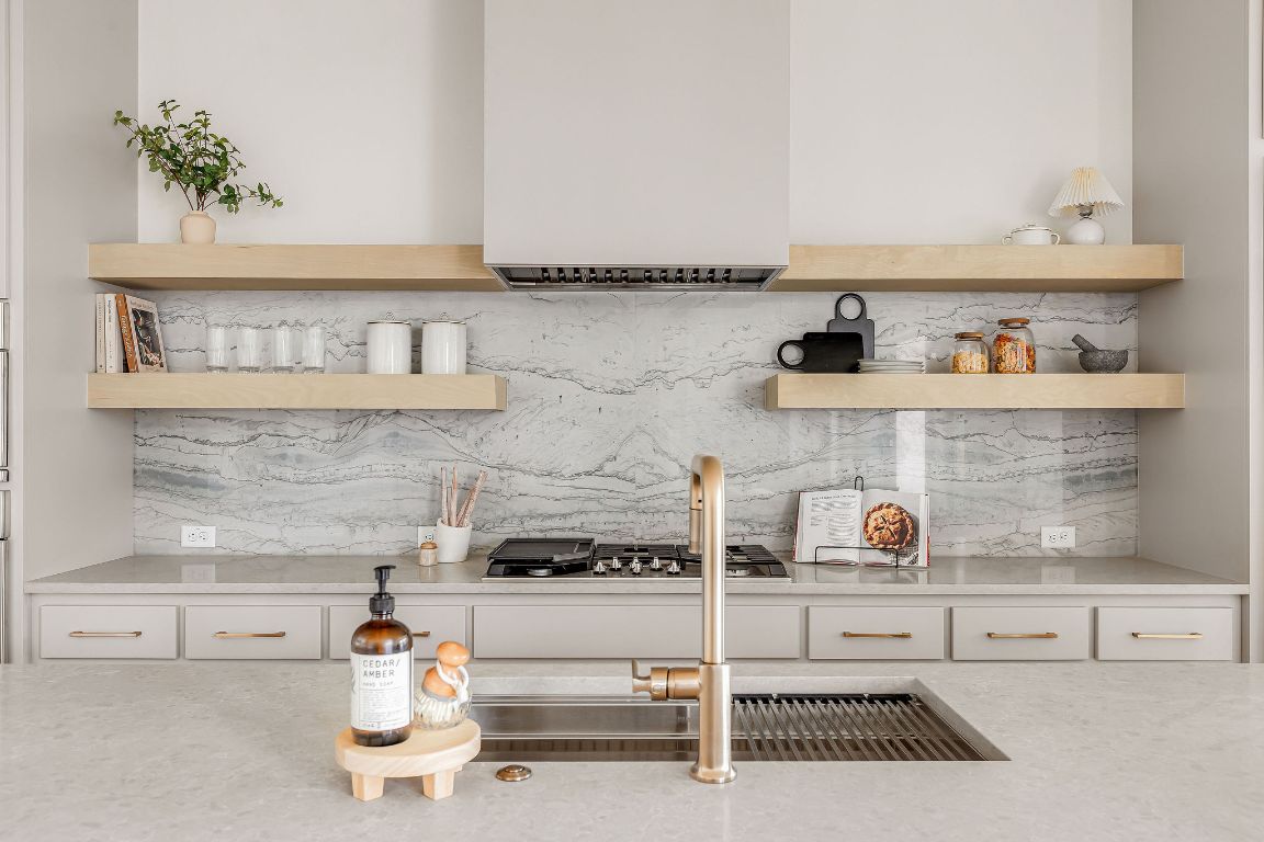 2607 Richcreek Road Austin, TX 78757 - Photo 13 of 40 a kitchen with a stove and cabinets
