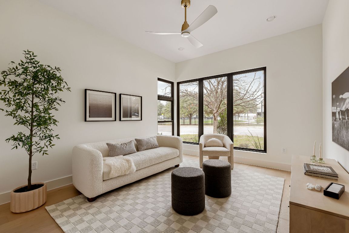 2607 Richcreek Road Austin, TX 78757 - Photo 23 of 40 a living room with furniture and a large window