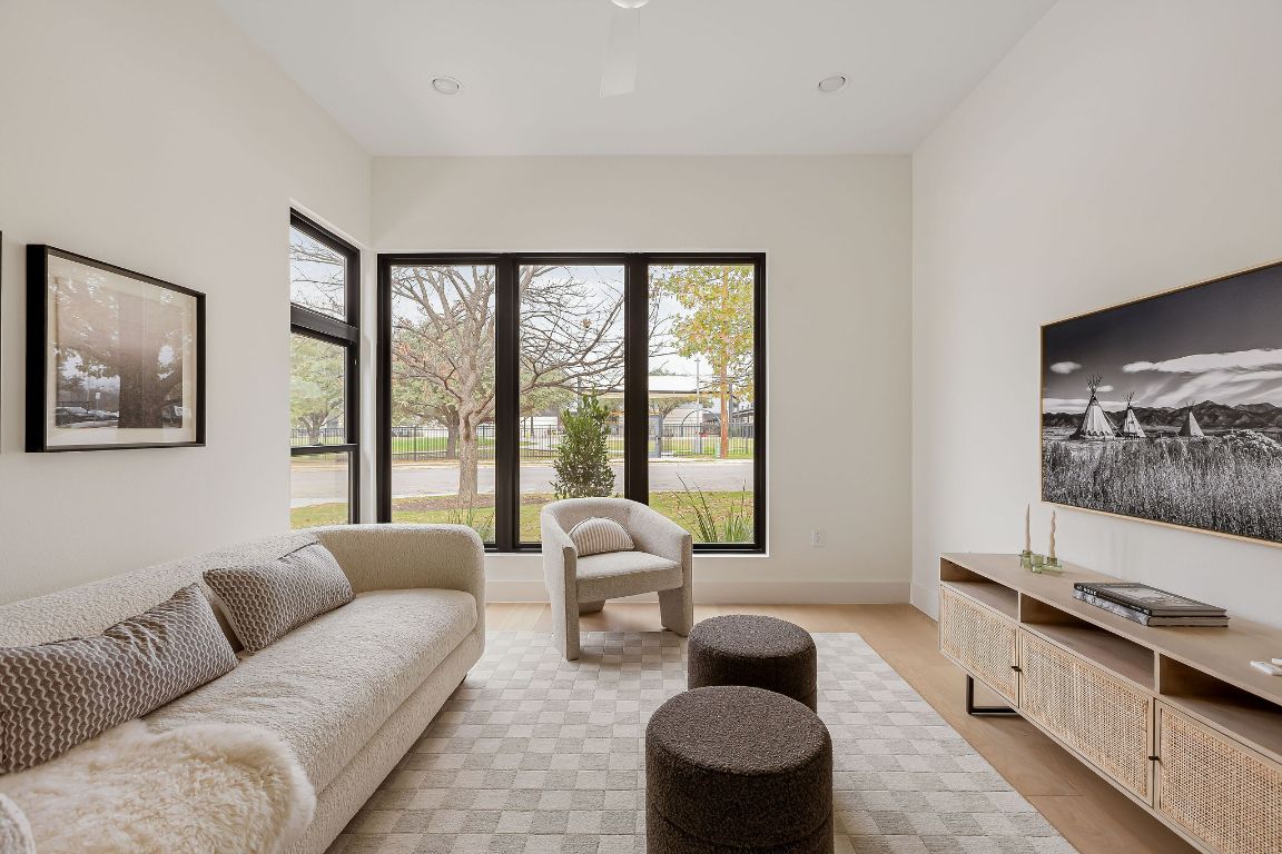 2607 Richcreek Road Austin, TX 78757 - Photo 24 of 40 a living room with furniture and a flat screen tv