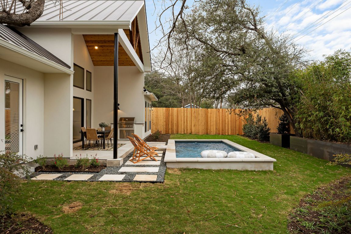 2607 Richcreek Road Austin, TX 78757 - Photo 30 of 40 a view of a backyard with a slide