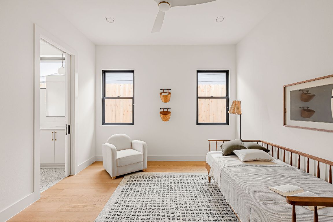 2607 Richcreek Road Austin, TX 78757 - Photo 36 of 40 a bedroom with furniture and window