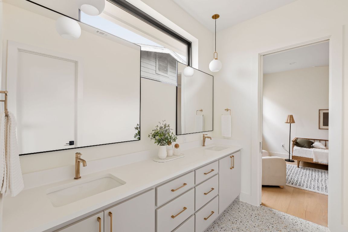 2607 Richcreek Road Austin, TX 78757 - Photo 39 of 40 a bathroom with a sink and a mirror