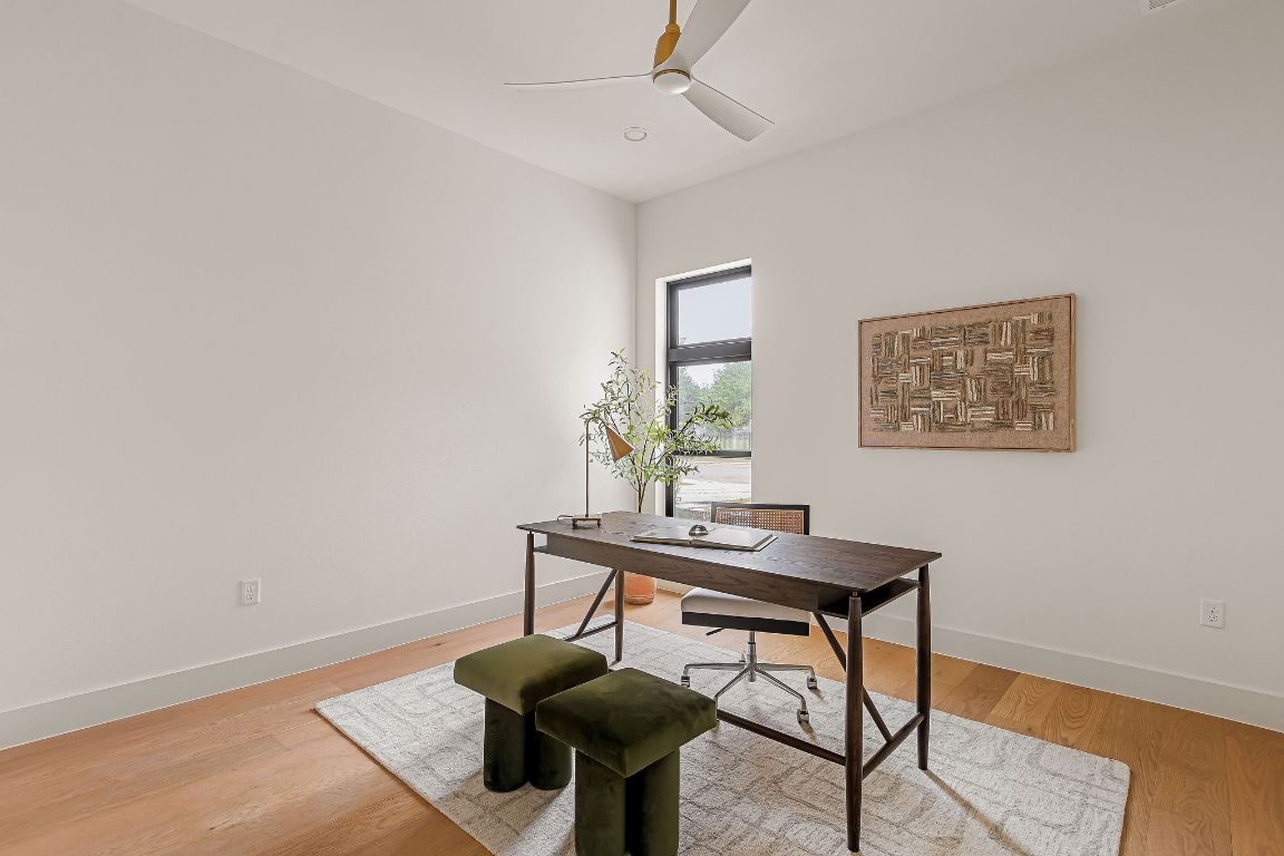 2607 Richcreek Road Austin, TX 78757 - Photo 40 of 40 a view of a workspace with furniture and wooden floor