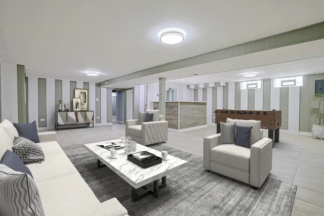 a living room with furniture and a table