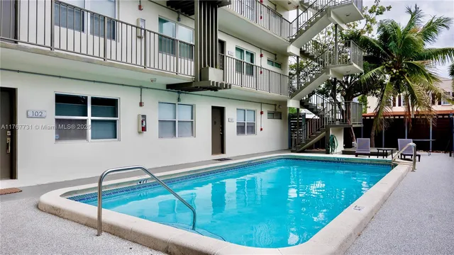 a view of a house with swimming pool