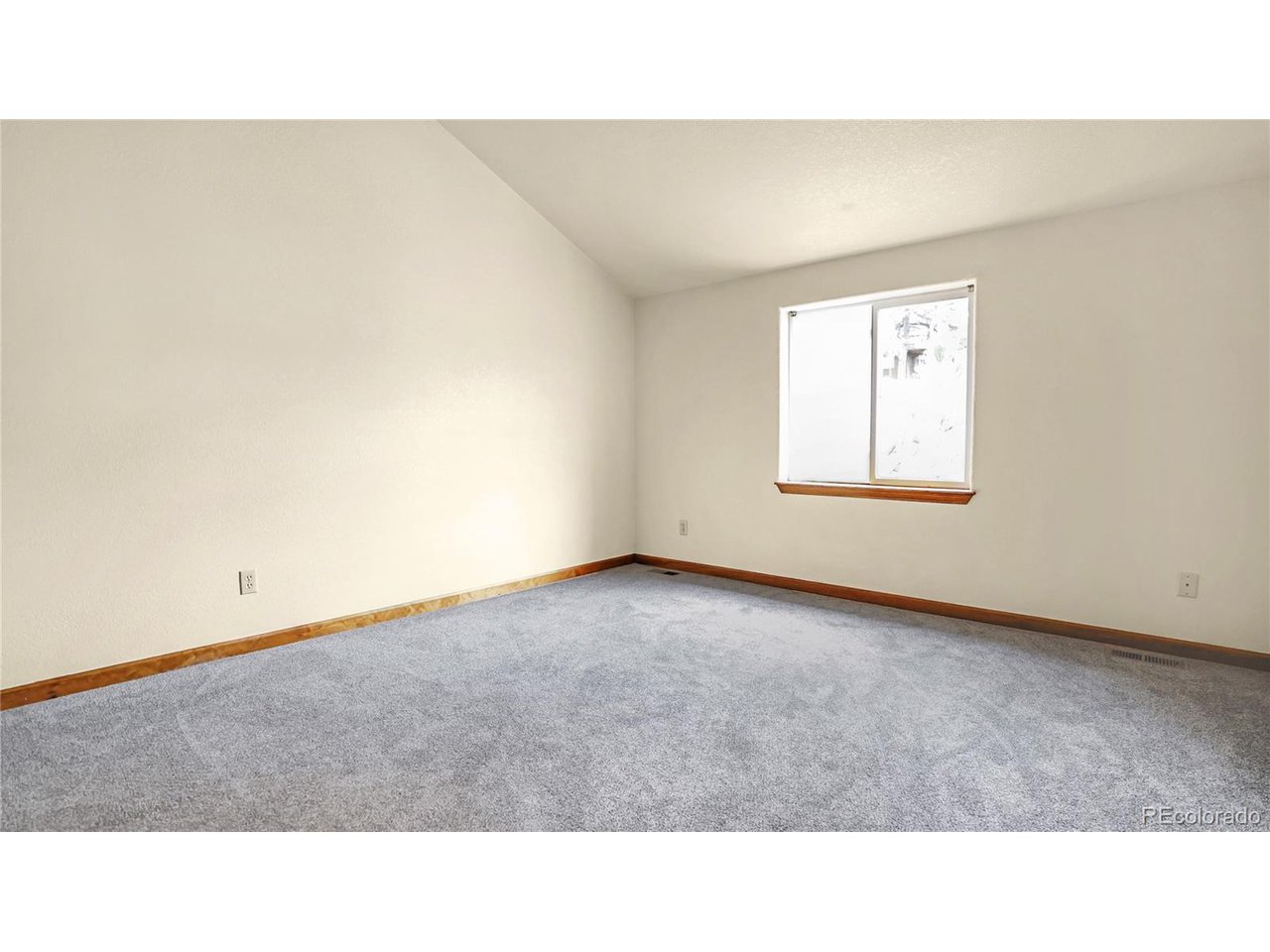 261 Wilkins Road Bailey, CO 80421 - Photo 13 of 39 a open hall with a bench