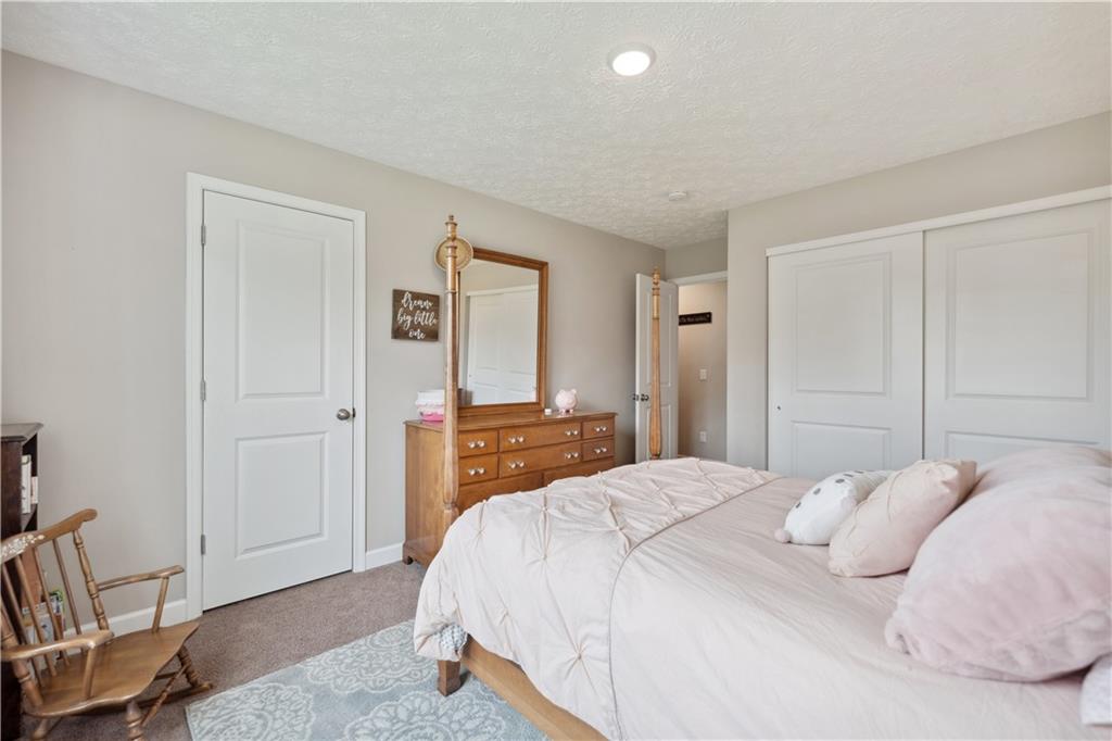 214 Lokomski Road Hookstown, PA 15050 - Photo 23 of 43 a bedroom with a bed and a closet