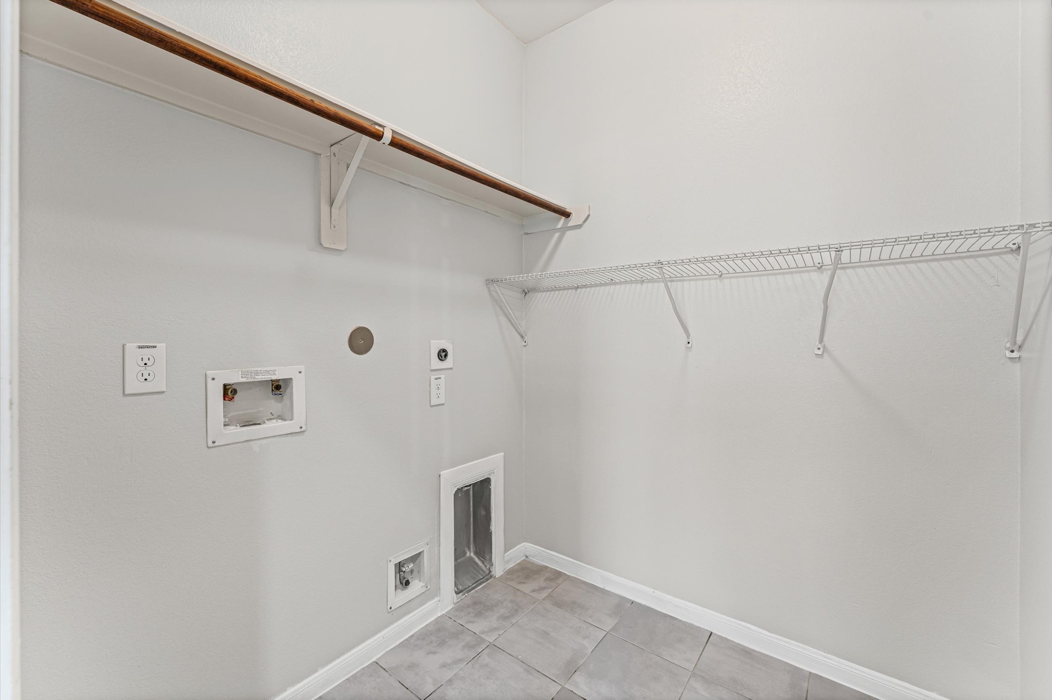 7018 Granite Terrace Lane Houston, TX 77083 - Photo 10 of 18 a view of a rack on the wall