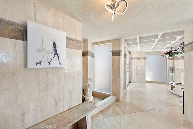 a large bathroom with a double vanity sink a mirror and a