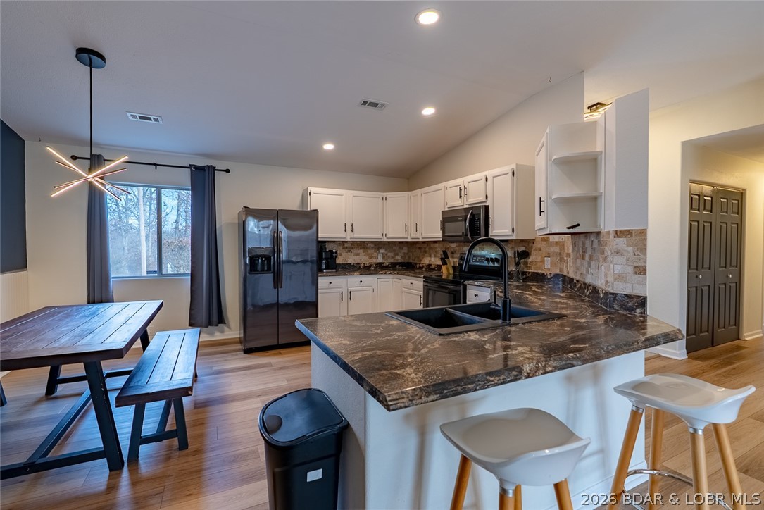 1670 Bittersweet Road Lake Ozark, MO 65049 - Photo 11 of 33 Kitchen / Dining