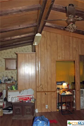 a kitchen with stainless steel appliances granite countertop a sink and cabinets