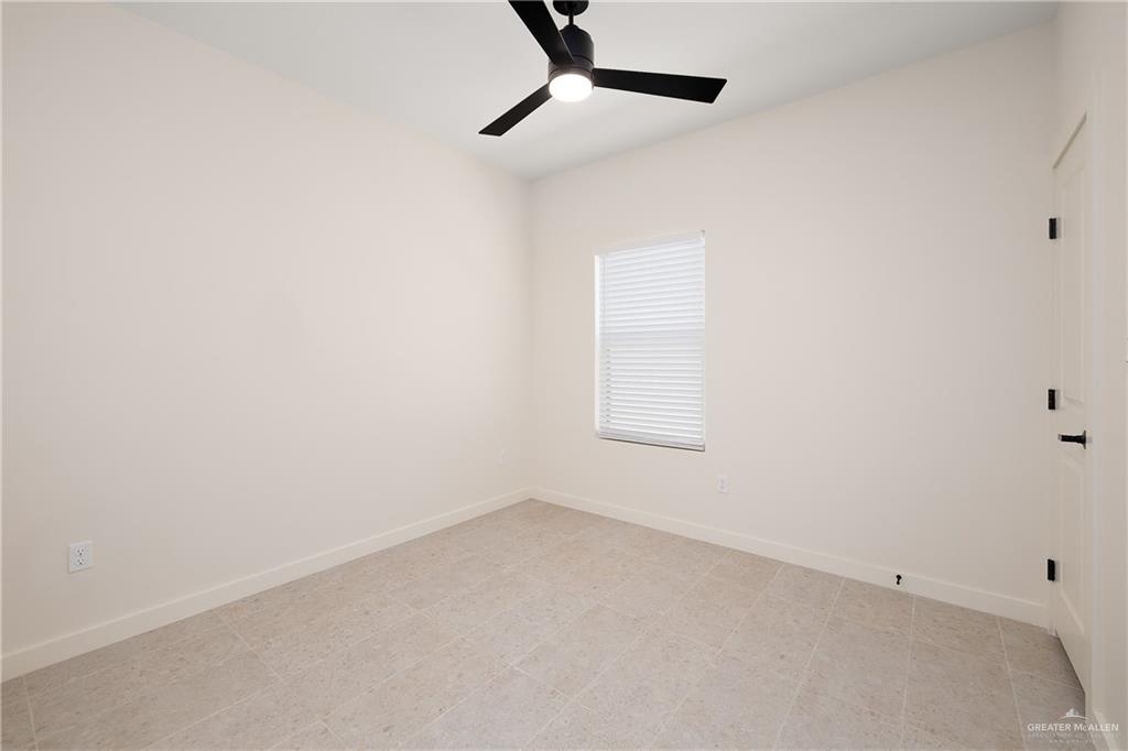 11501 North 25th Street, Unit 2 McAllen, TX 78504 - Photo 11 of 22 an empty room with a window