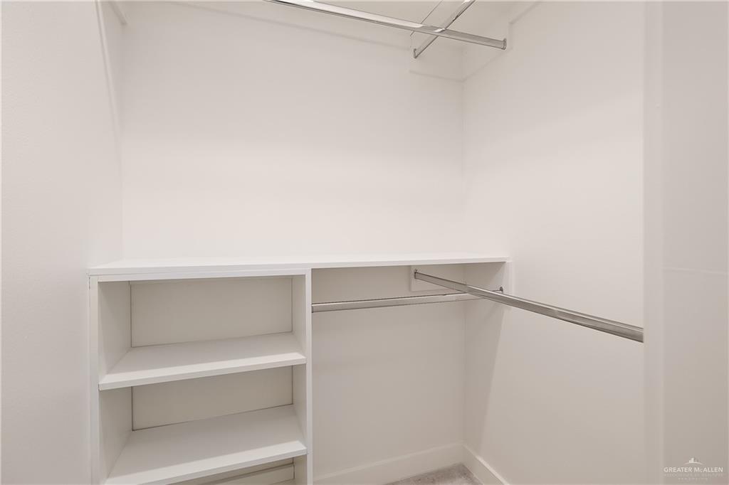 11501 North 25th Street, Unit 2 McAllen, TX 78504 - Photo 12 of 22 a view of an empty walk in closet