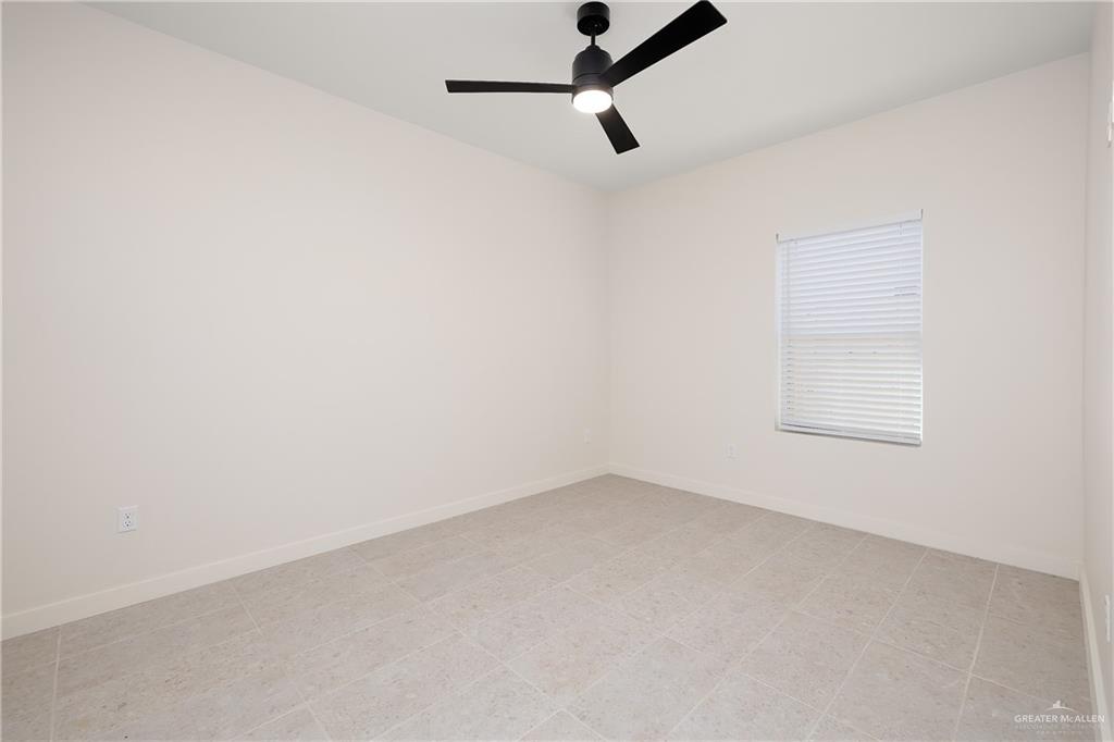 11501 North 25th Street, Unit 2 McAllen, TX 78504 - Photo 18 of 22 an empty room with a window