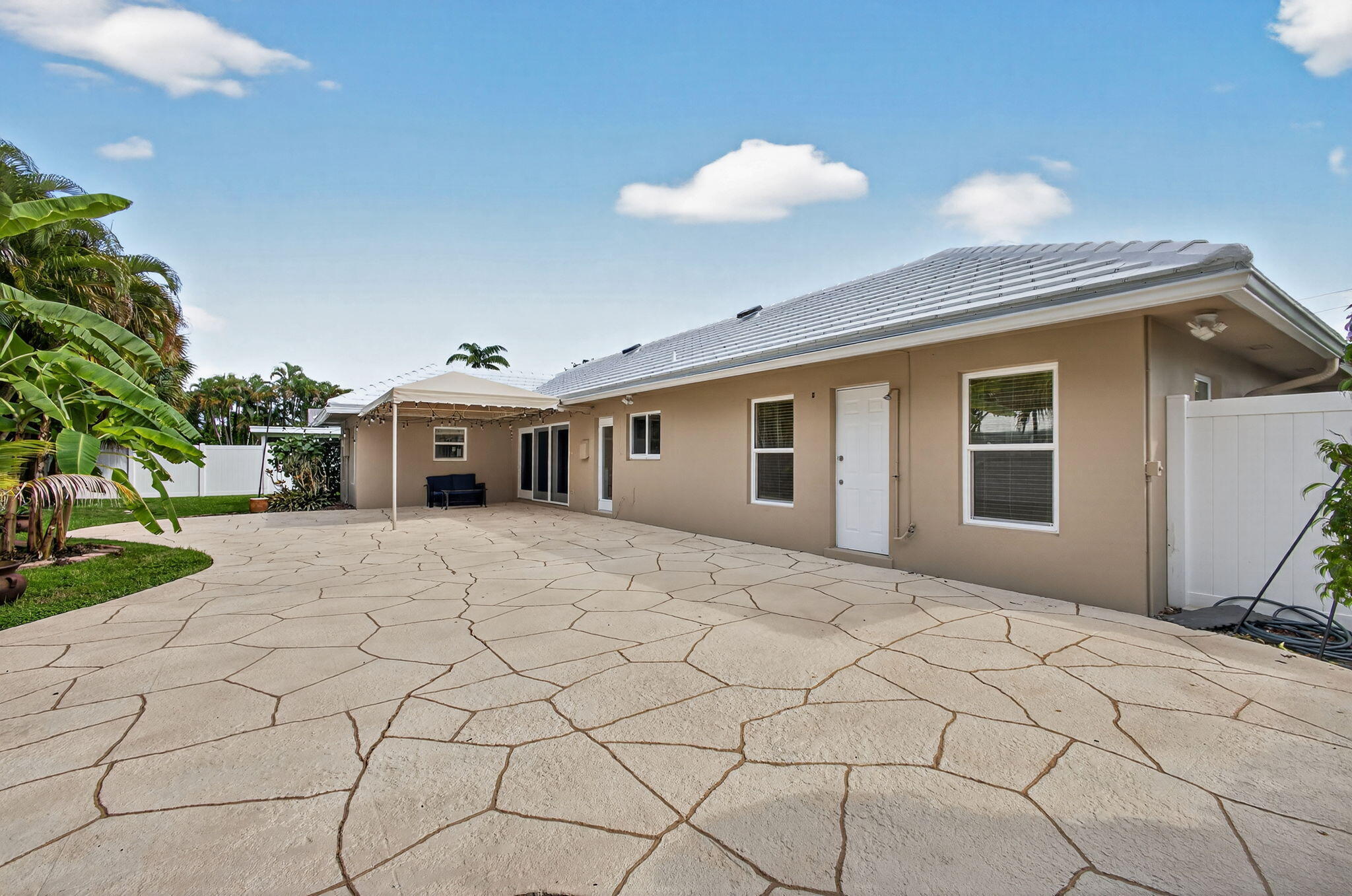 1206 Dolphin Road Singer Island, FL 33404 - Photo 59 of 65 Back Patio & Yard