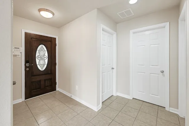 a view of a hallway with elevator
