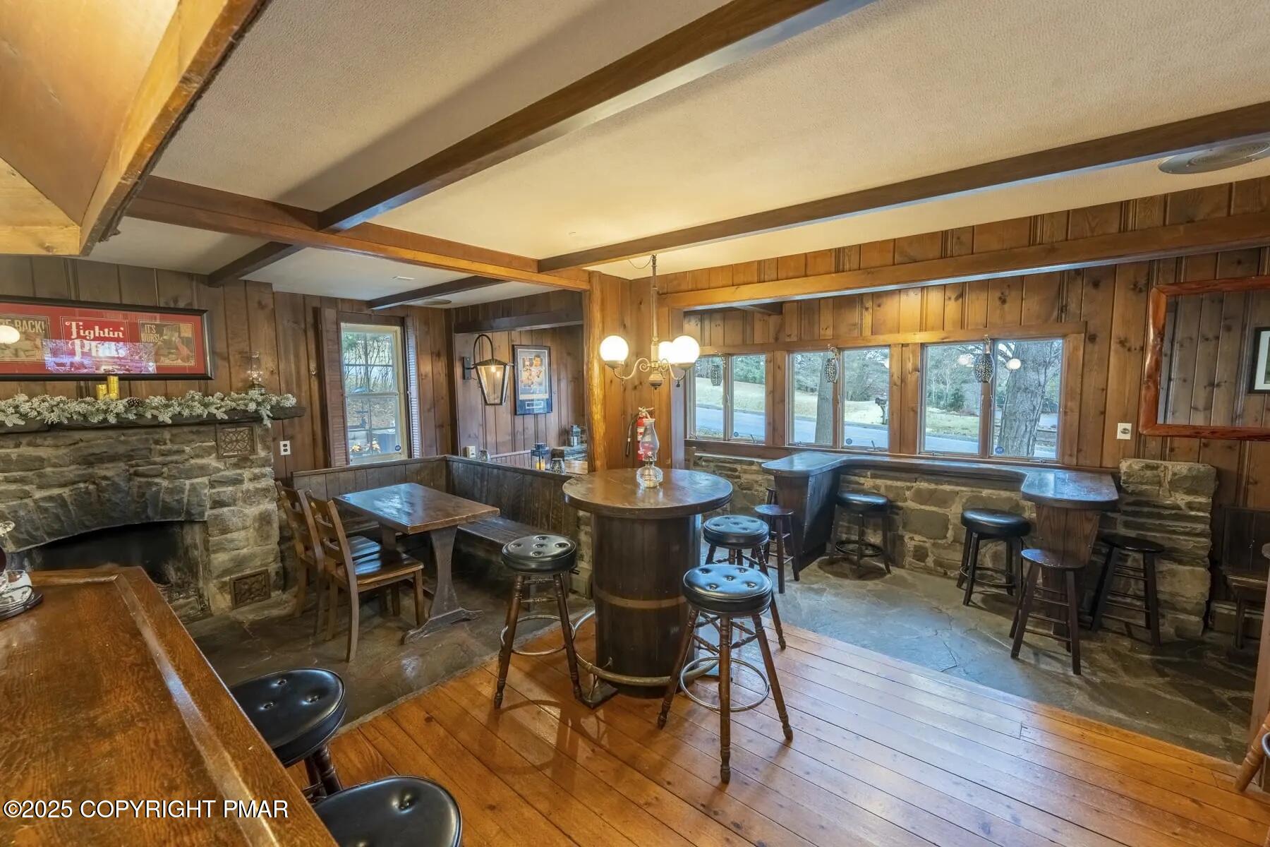 2735 Highway 390 Canadensis, PA 18325 - Photo 13 of 55 a view of a dining room with furniture window and wooden floor