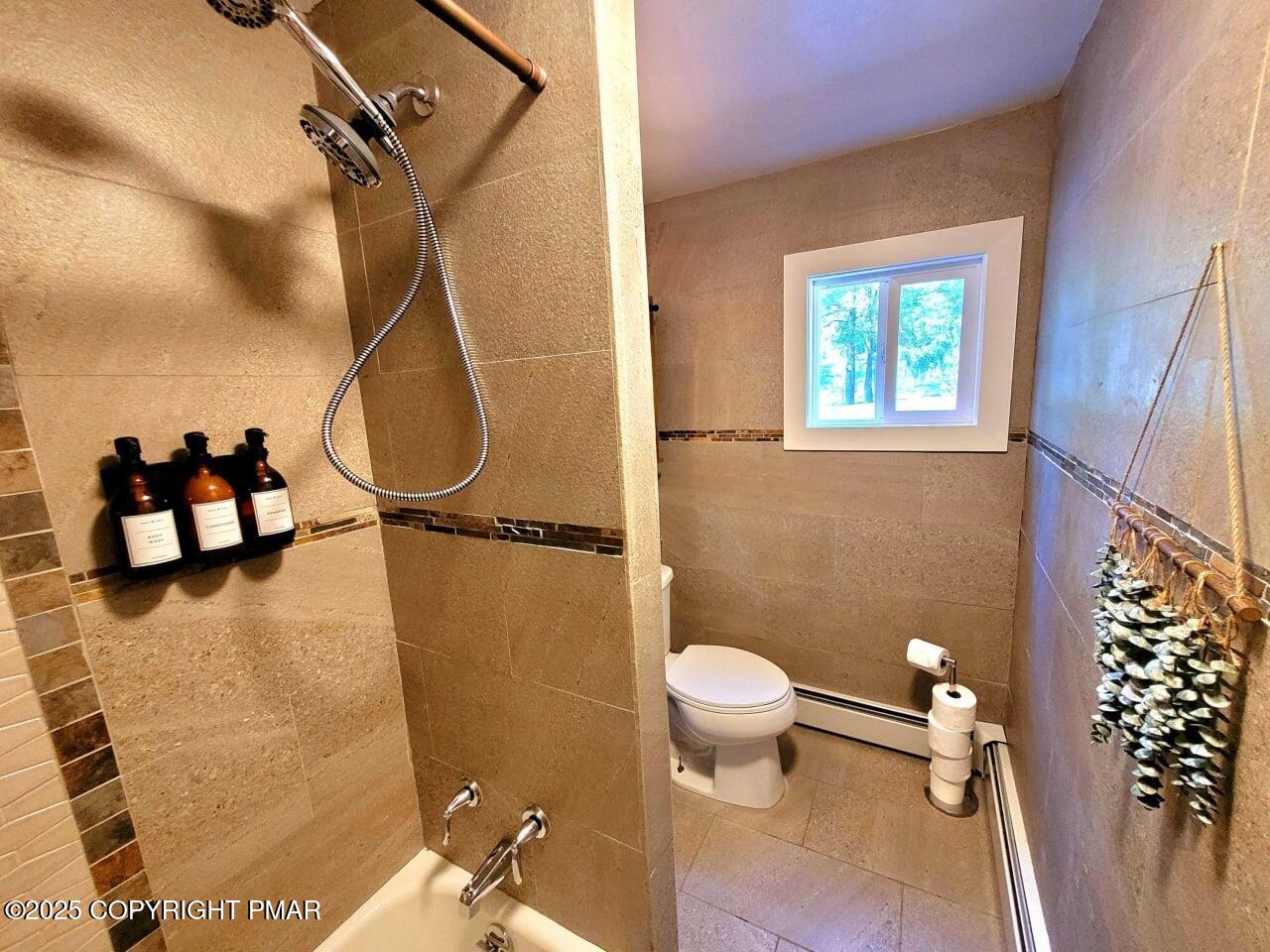 2735 Highway 390 Canadensis, PA 18325 - Photo 17 of 55 a bathroom with a toilet and a shower