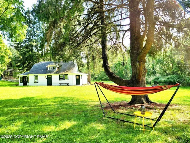a view of a house with a patio