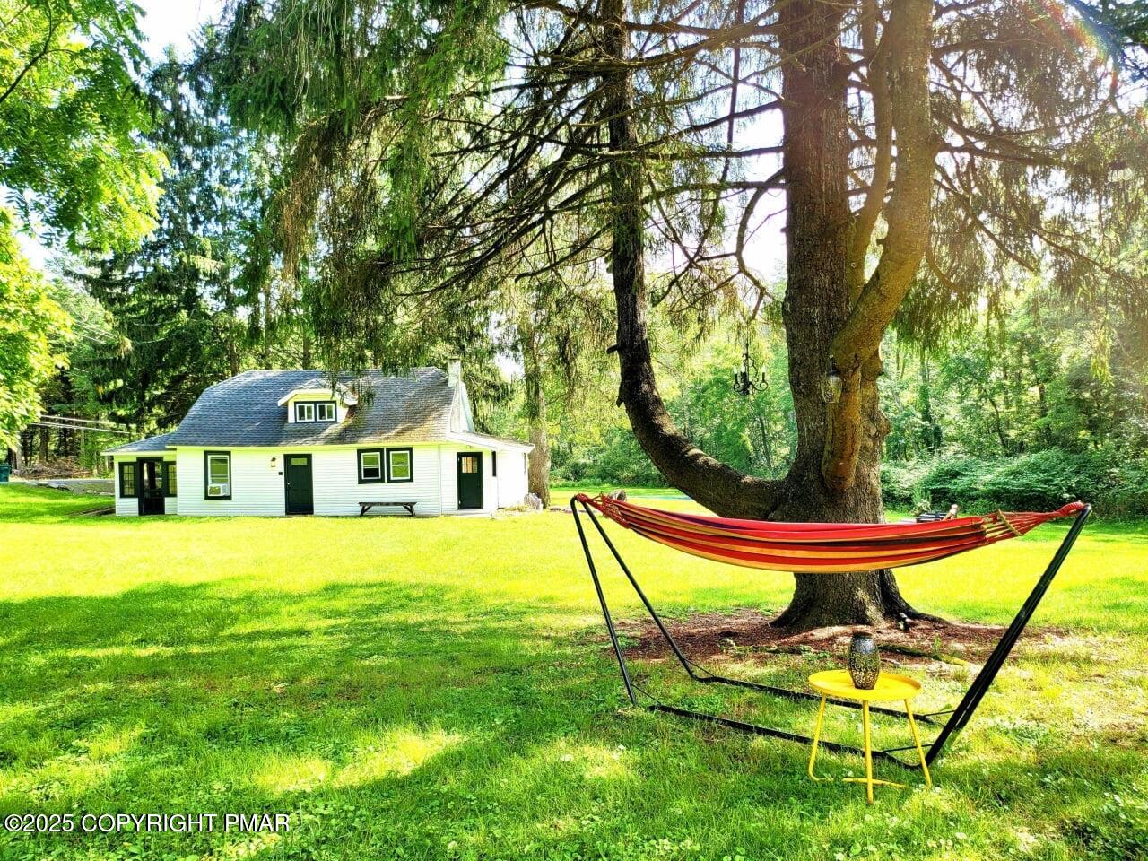 2735 Highway 390 Canadensis, PA 18325 - Photo 31 of 55 a view of a house with backyard and sitting area