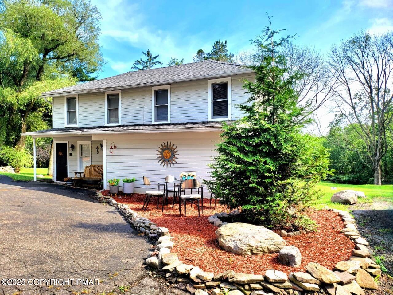 2735 Highway 390 Canadensis, PA 18325 - Photo 32 of 55 a view of a house with a patio
