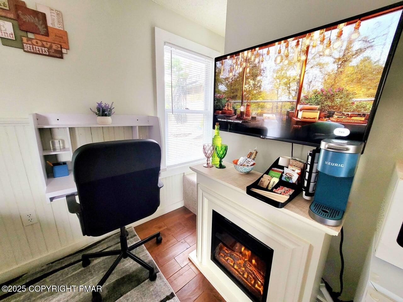 2735 Highway 390 Canadensis, PA 18325 - Photo 34 of 55 a living room with furniture and a floor to ceiling window