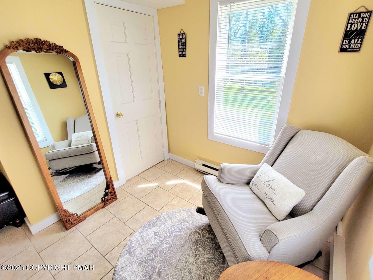 2735 Highway 390 Canadensis, PA 18325 - Photo 40 of 55 a living room with furniture and a window