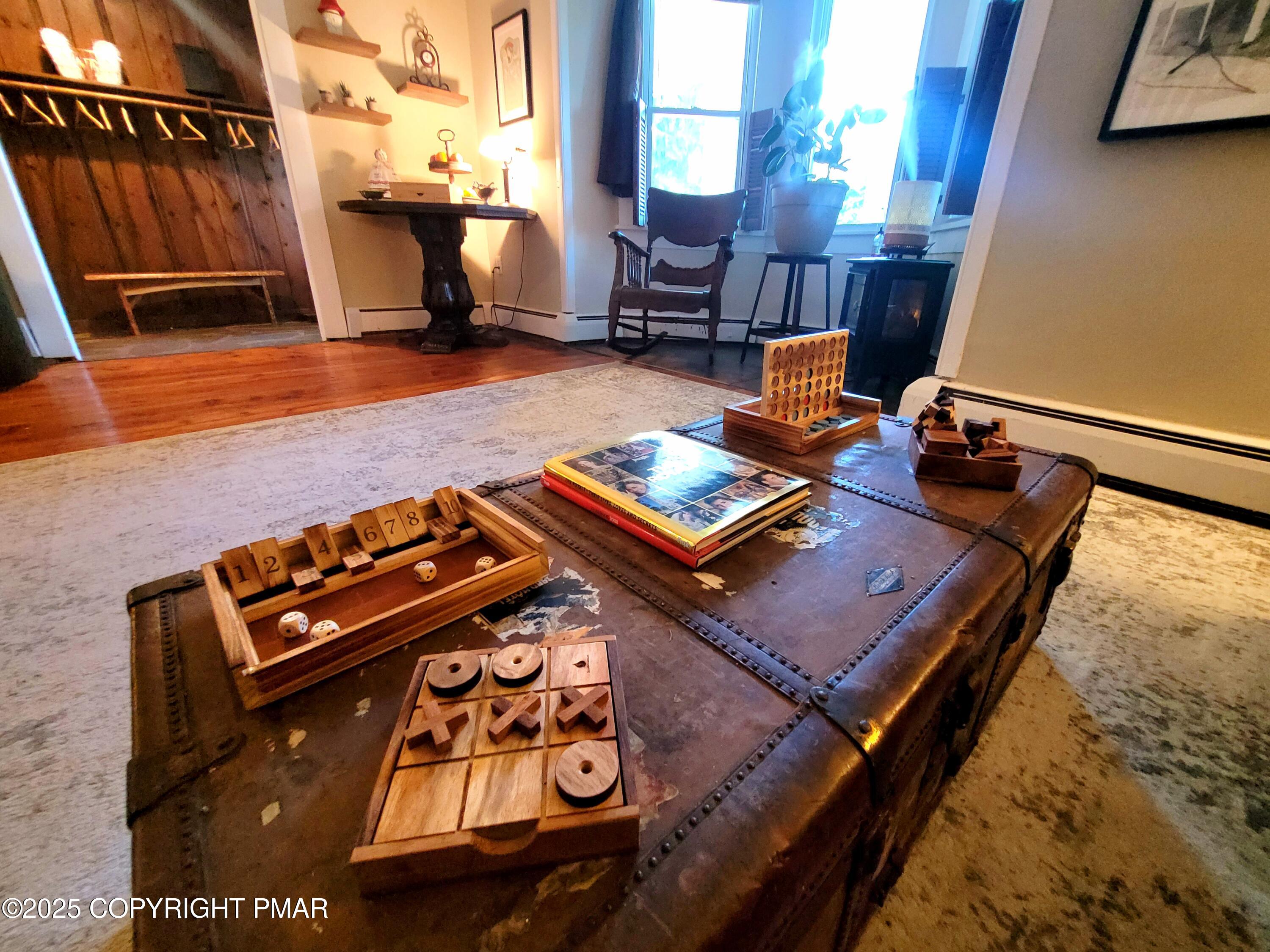 2735 Highway 390 Canadensis, PA 18325 - Photo 5 of 55 a living room with furniture and wooden floor