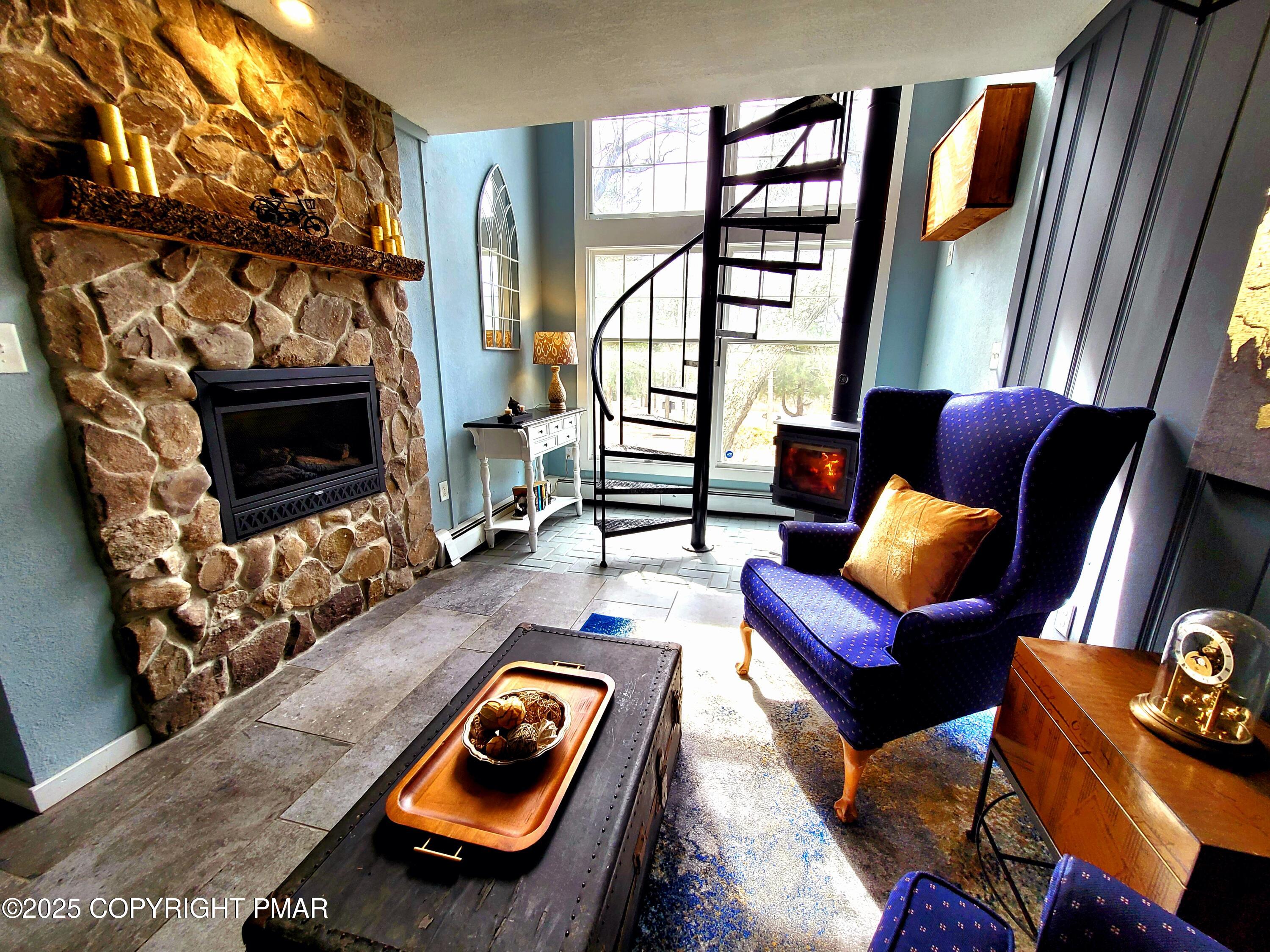 2735 Highway 390 Canadensis, PA 18325 - Photo 6 of 55 a living room with furniture a rug and a window