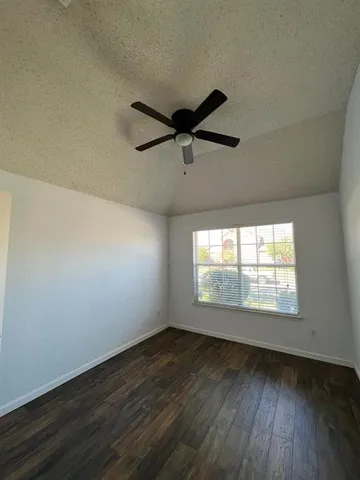 a view of a backyard with green space