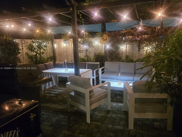 a outdoor space with lots of tables and chairs
