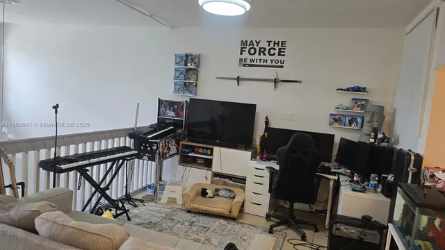 a bedroom with two beds and a window