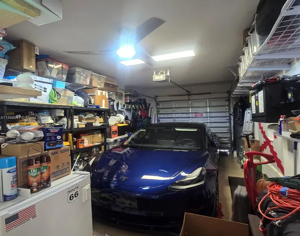 a view of storage and utility room with a sink