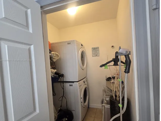a front view of a house with a yard table and chairs