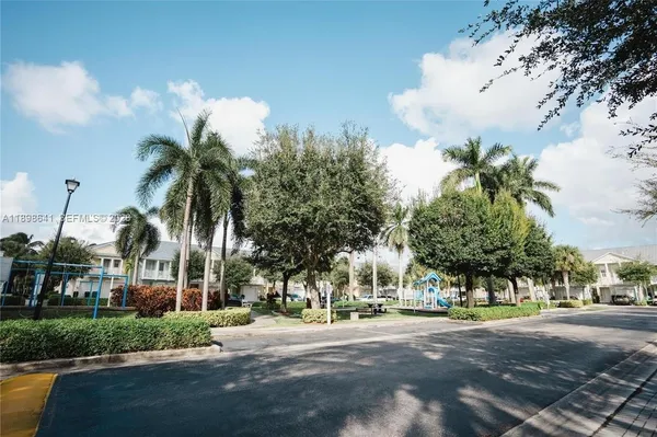 a view of road and trees