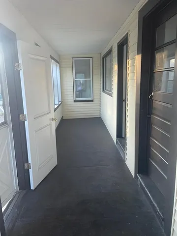 a kitchen with a sink stove and microwave