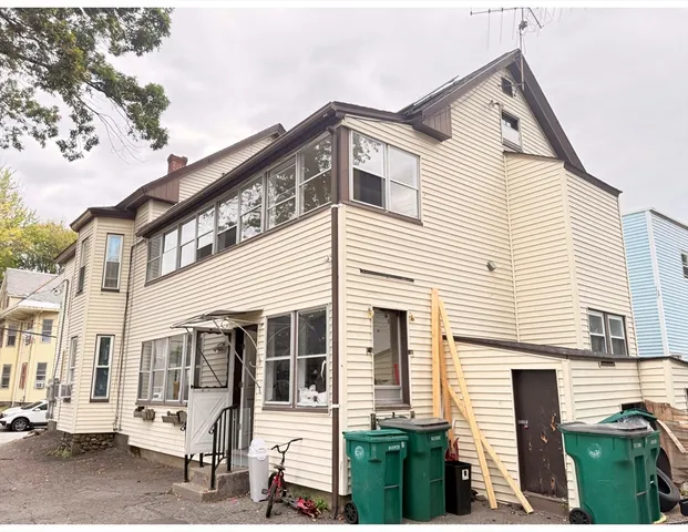 a view of a house with a small garden