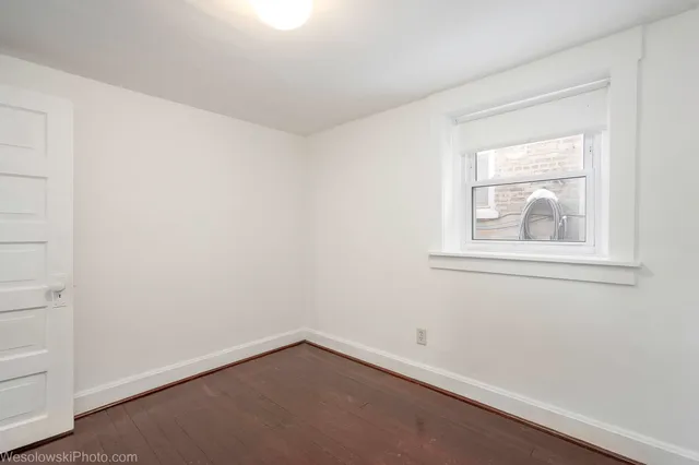 a picture of a bench in front of door