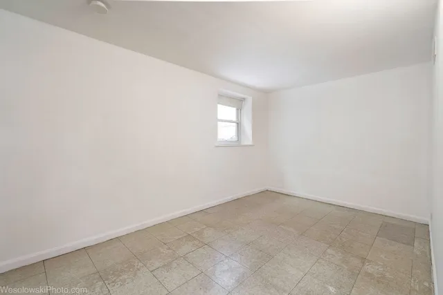 a picture of a bench in front of door