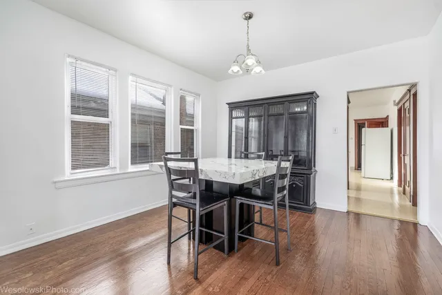 a kitchen with stainless steel appliances granite countertop a stove top oven a sink and cabinets