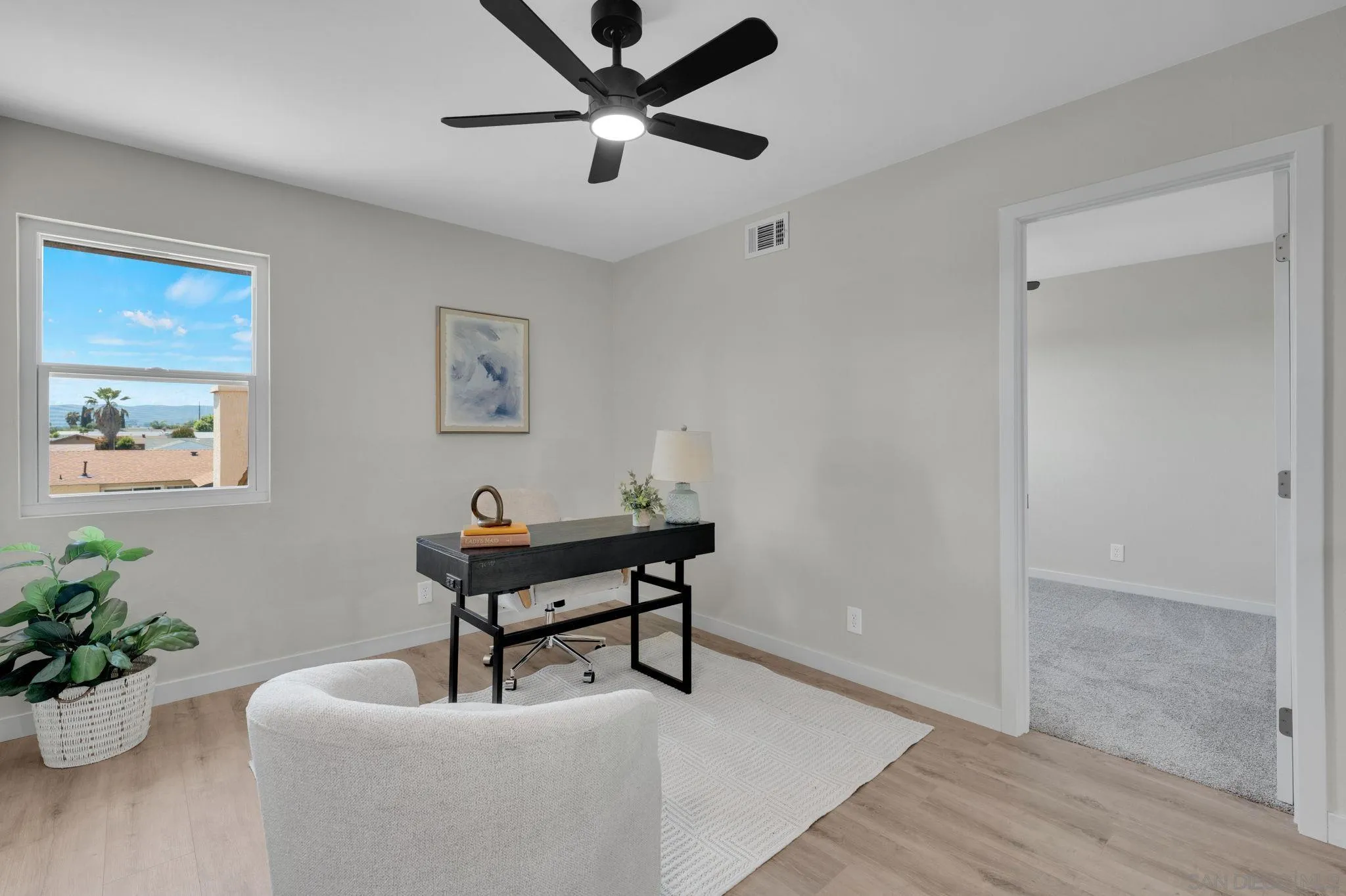 13322 Via Mark Poway, CA 92064 - Photo 17 of 25 a living room with furniture and a potted plant