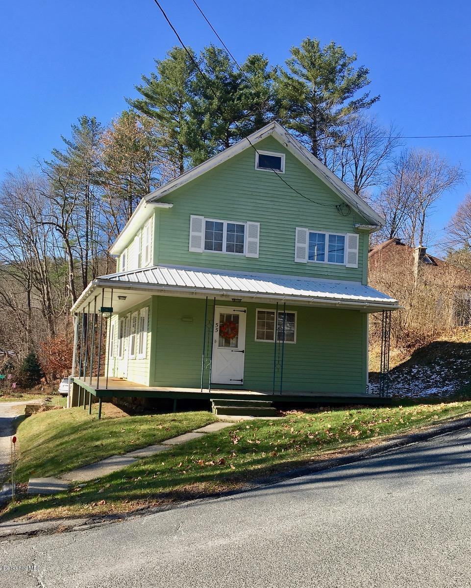 55 Cross Road Clarksburg, MA 01247 - Photo 1 of 22 a front view of a house with a garden